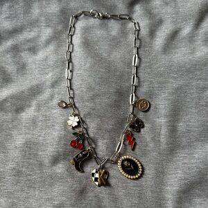 Silver Charm Necklace with Black and Gold Accents